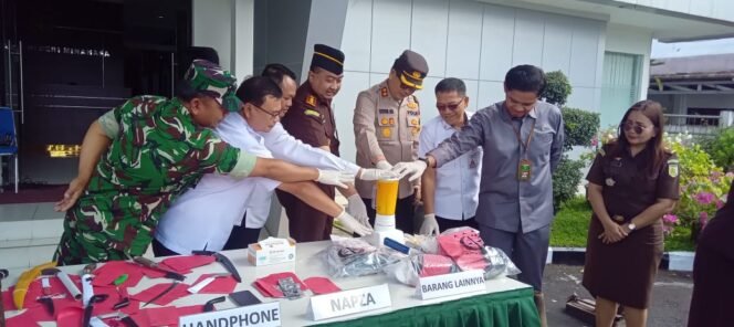 
					Kodim 1302/Minahasa Hadiri Pemusnahan Barang Bukti Inkracht, Tegaskan Dukungan TNI pada Penegakan Hukum